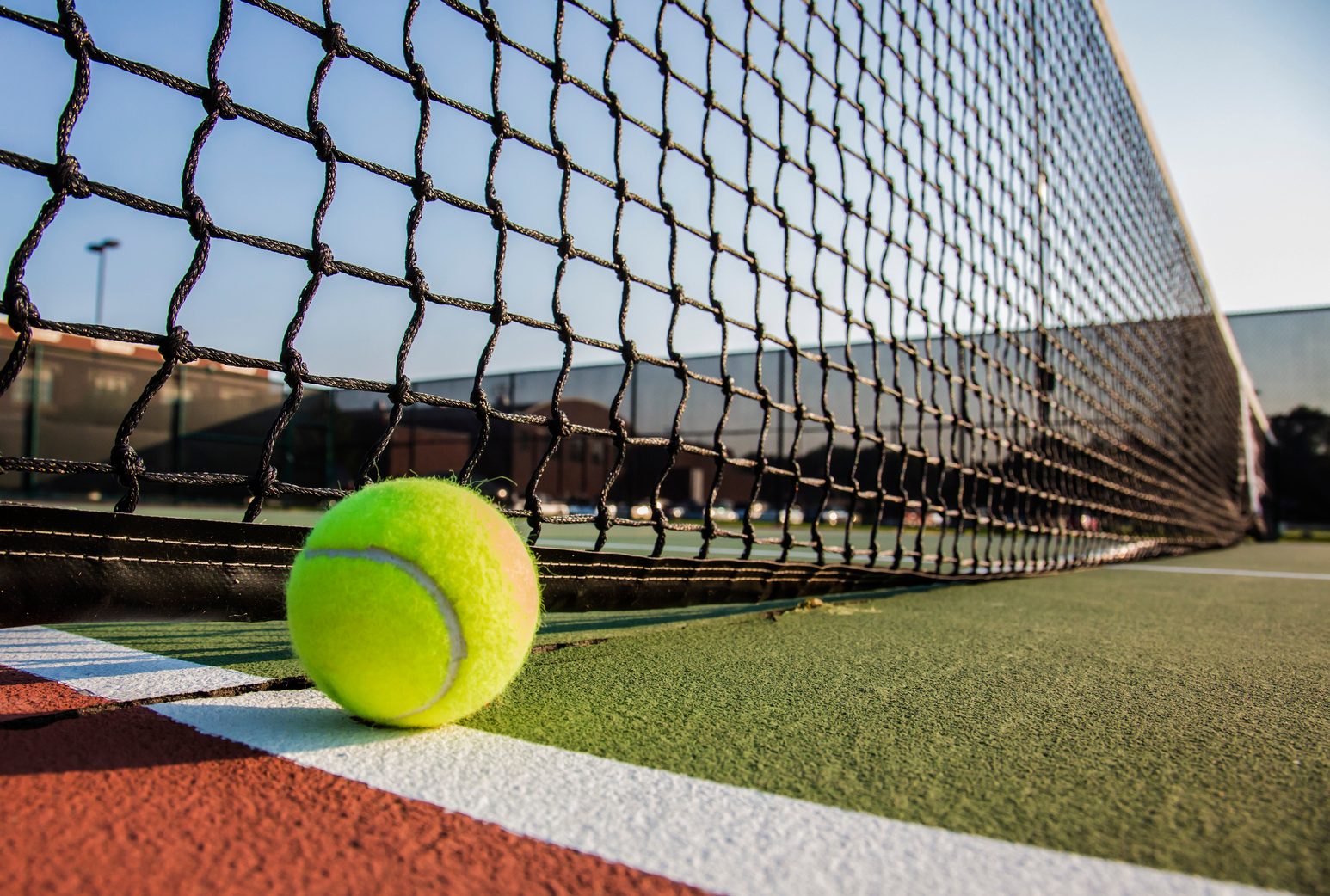 Tennis court with tennis ball close up